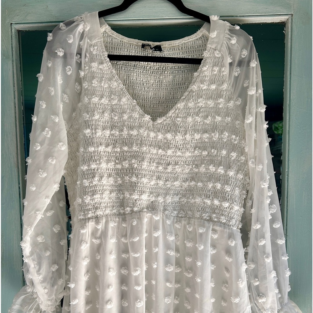 Babydoll with dotted flowy ruffles